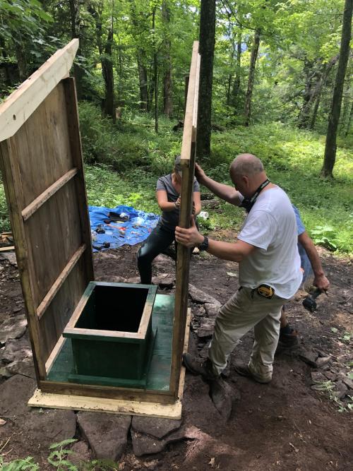 Trail Conference volunteers constructing the new Baldwin Shelter Privy in the Catskills.